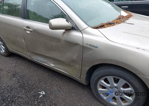 2007 Toyota Camry Hybrid z USA, uszkodzony, nr VIN JTNBB46K773010418